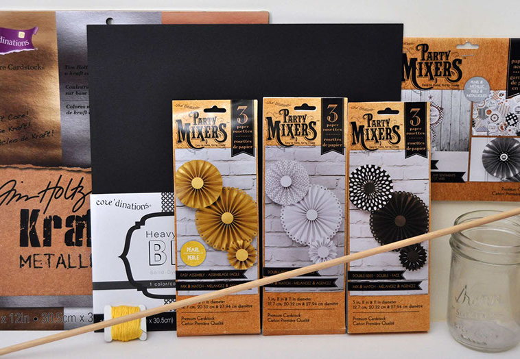 supplies for graduation themed decor with paper rosettes